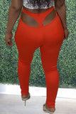 Orange Sexy Casual Solid Hollowed Out Skinny Mid Waist Pencil Trousers