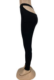 Orange Sexy Casual Solid Hollowed Out Skinny Mid Waist Pencil Trousers