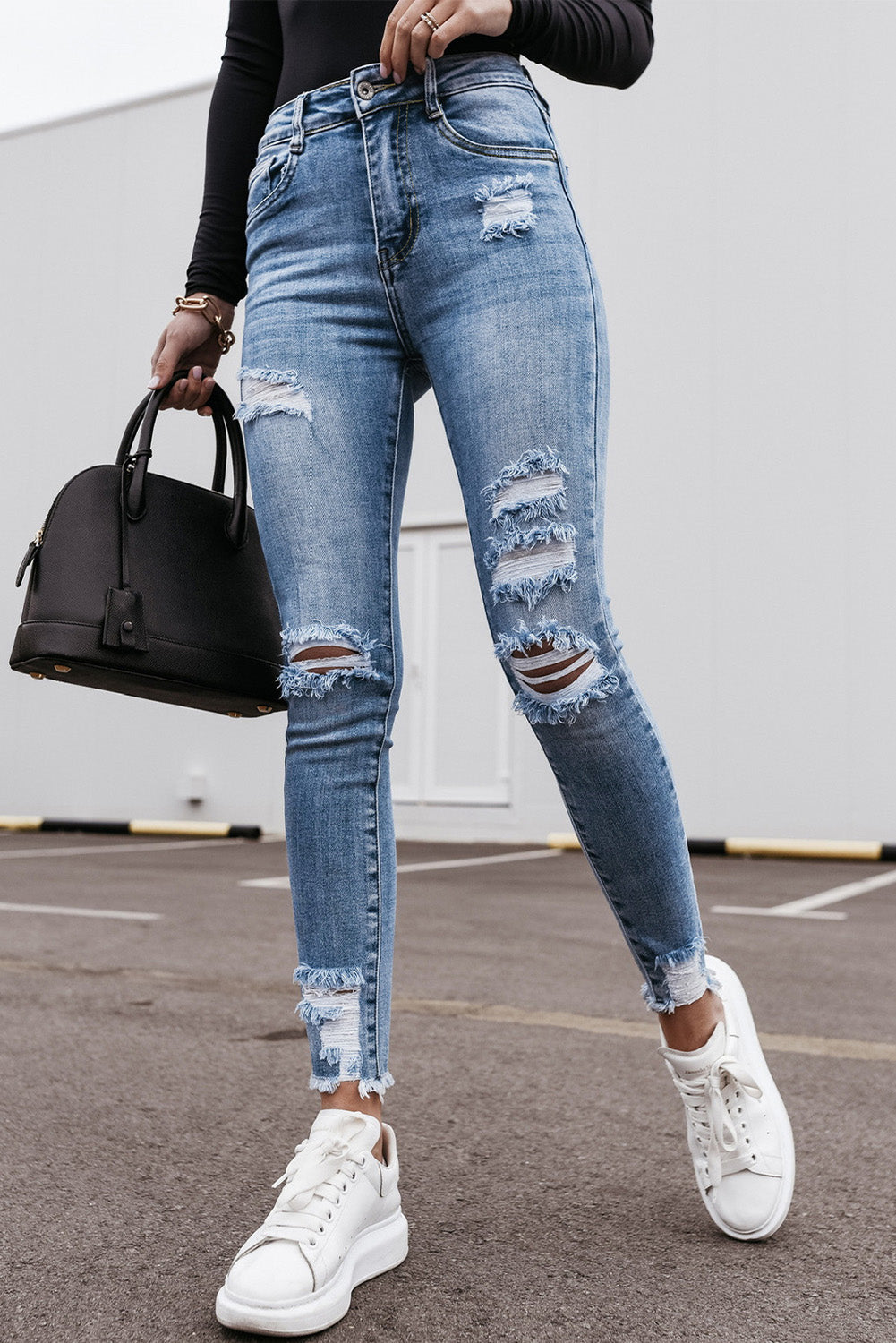 Skinny High Rise Ripped Tapered Jeans