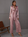 collared v neck jumpsuit with tie detail