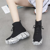 knitted graffiti high platform ankle boots