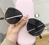 metal half frame round sunglasses